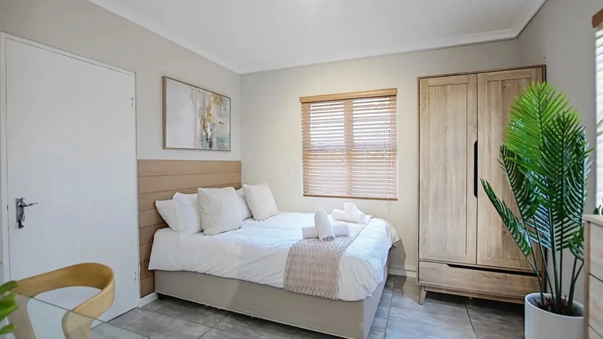 Stylish serviced apartment interior for digital nomad stays